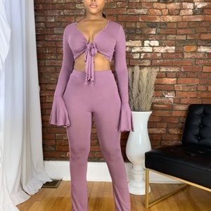 NWT 2 piece pants set. Beautiful material. Never worn.